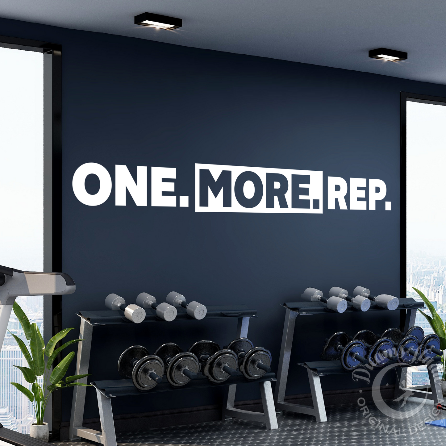 Gym interior with weightlifting equipment and motivational wall quote 'ONE. MORE. REP.'