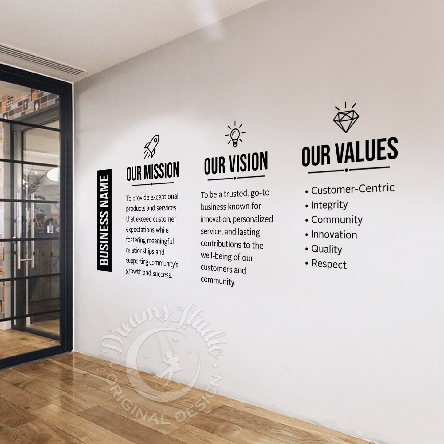 Wall with 'Our Mission', 'Our Vision', and 'Our Values' text on a modern interior setting.
