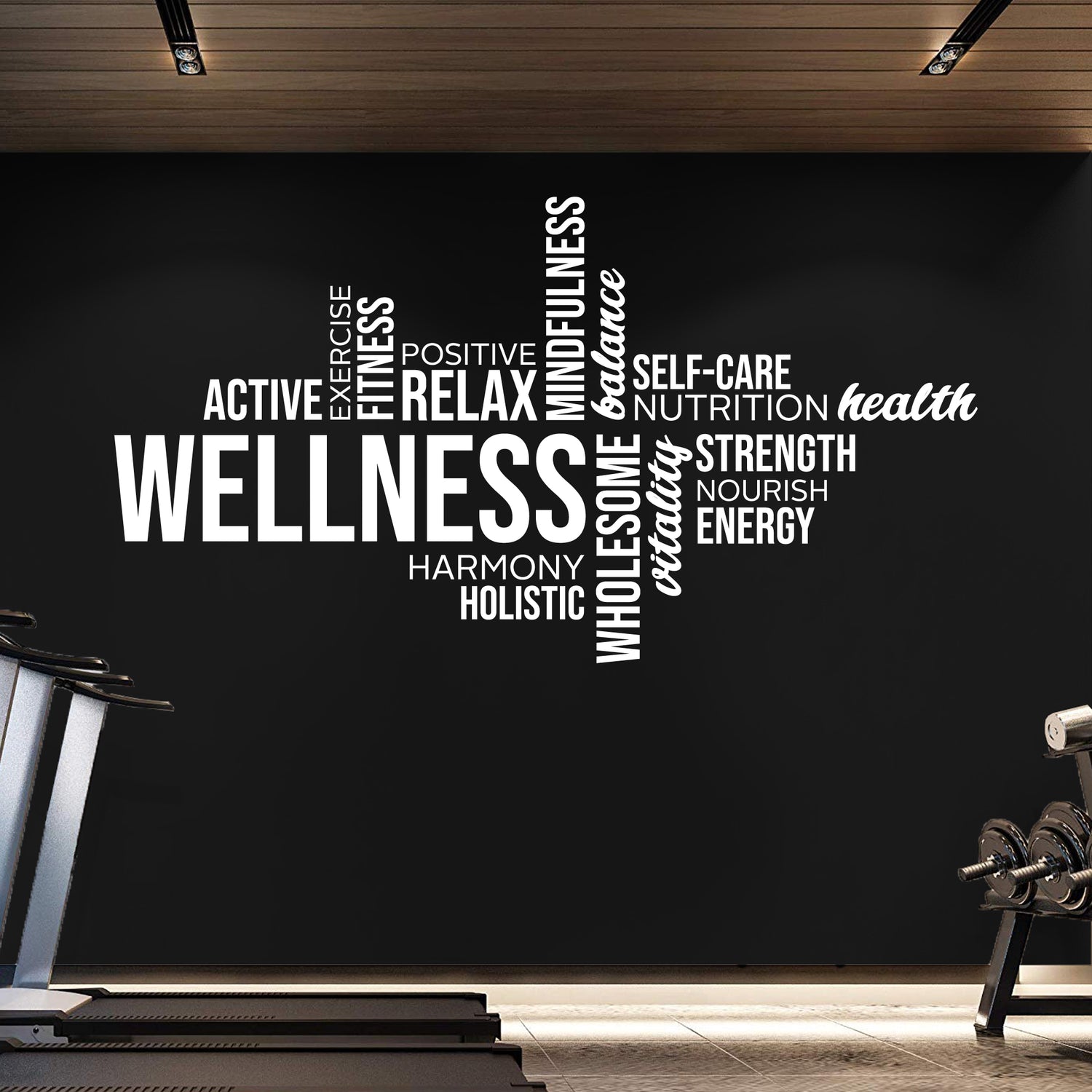 Gym interior with a wall featuring wellness-related word cloud