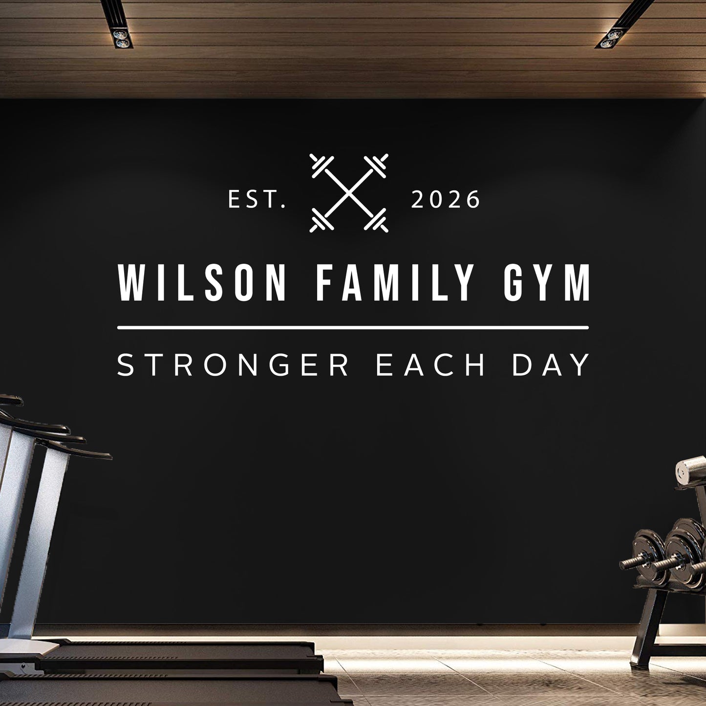 Gym interior with 'Wilson Family Gym' branding on a black wall.