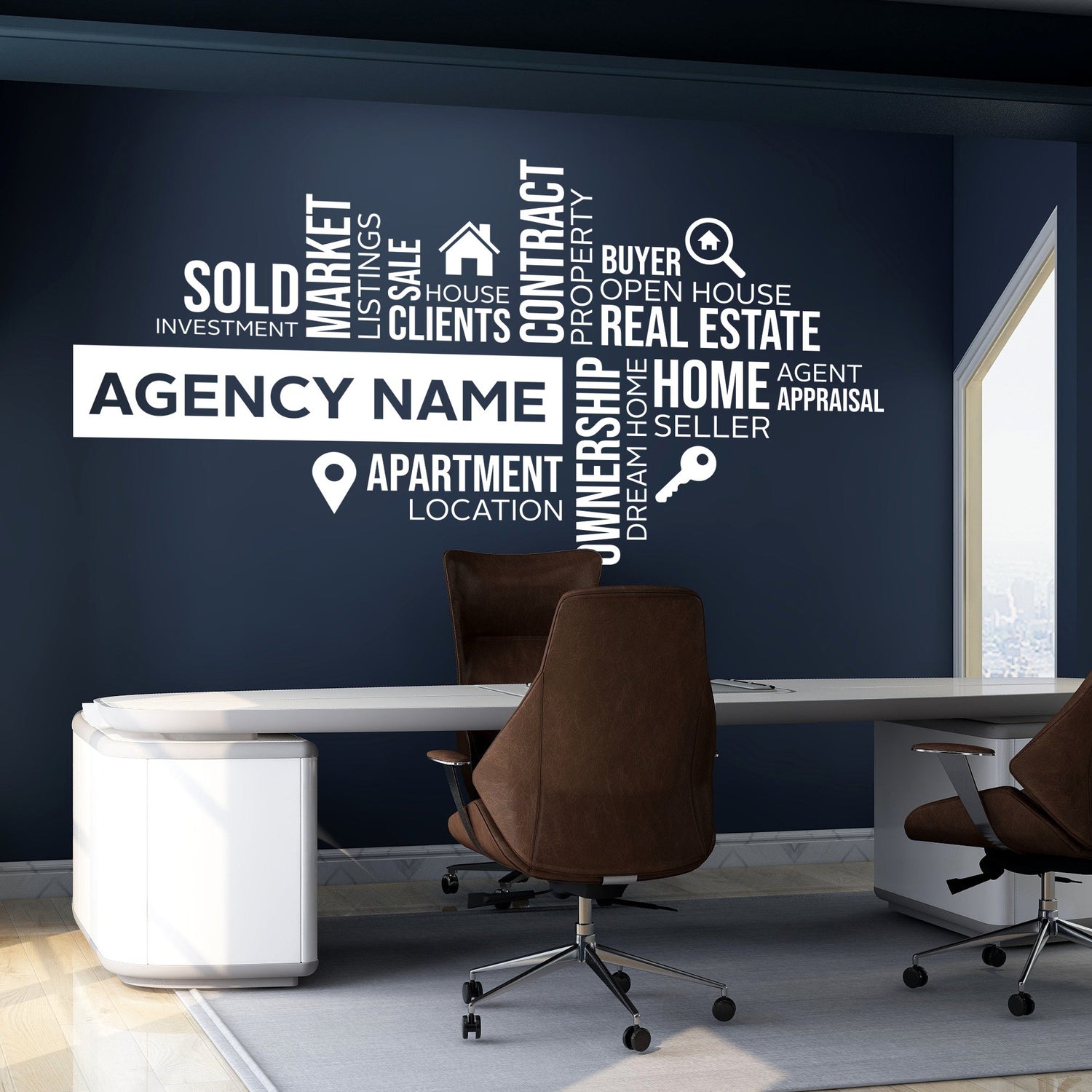 Modern office interior with a large wall mural featuring real estate-related words.