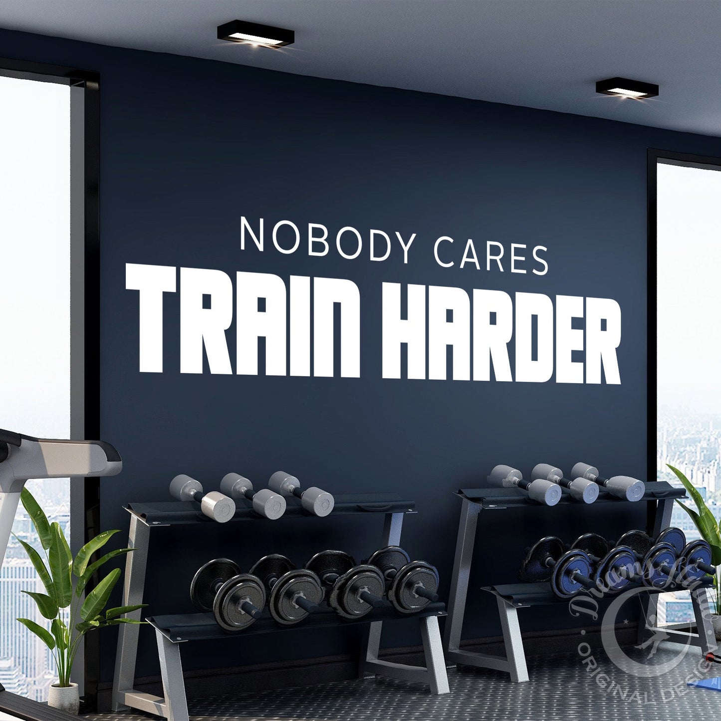 Gym interior with motivational quote on wall, dumbbells, and exercise equipment.
