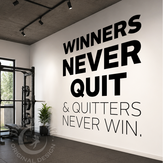 Gym interior with motivational quote 'Winners never quit & quitters never win' on the wall.