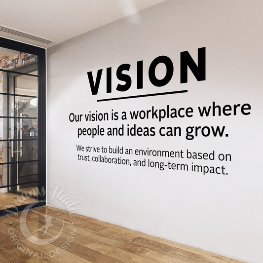Wall with 'VISION' quote in a modern office setting