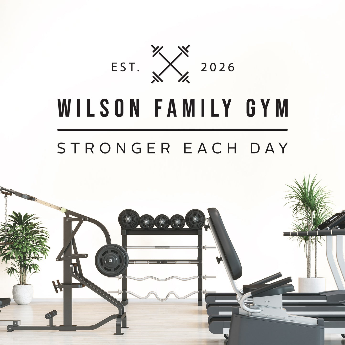Gym equipment with 'Wilson Family Gym' branding and motivational quote on a white background