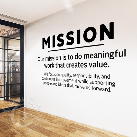Modern office interior with a wall quote about mission and values.