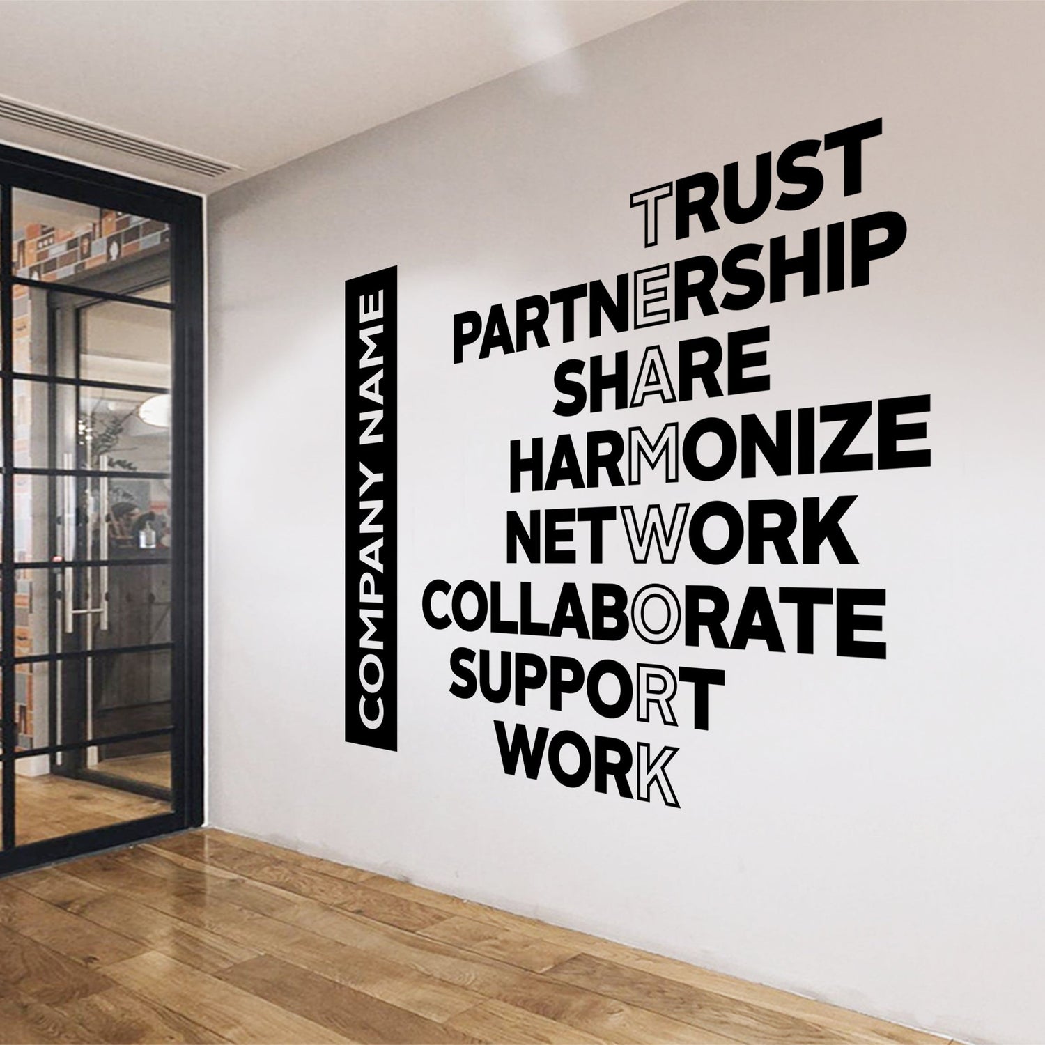 Wall with motivational phrases and a door in the background