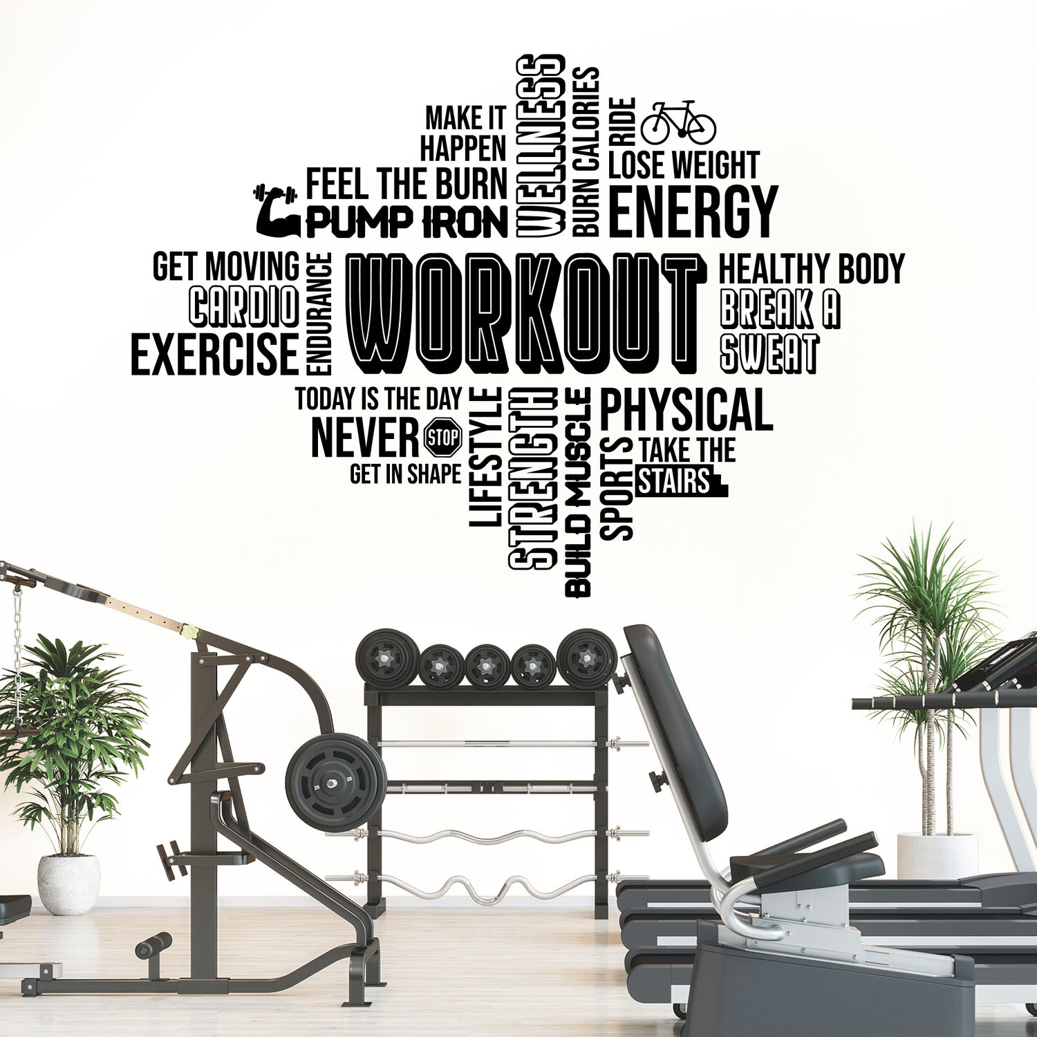 Gym interior with motivational fitness wall decal on a white wall.