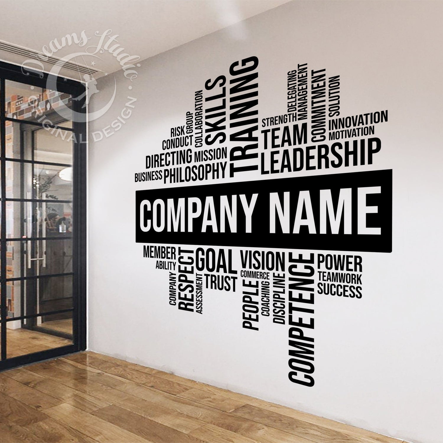 Wall with motivational and business-themed word cloud design in a modern office setting.