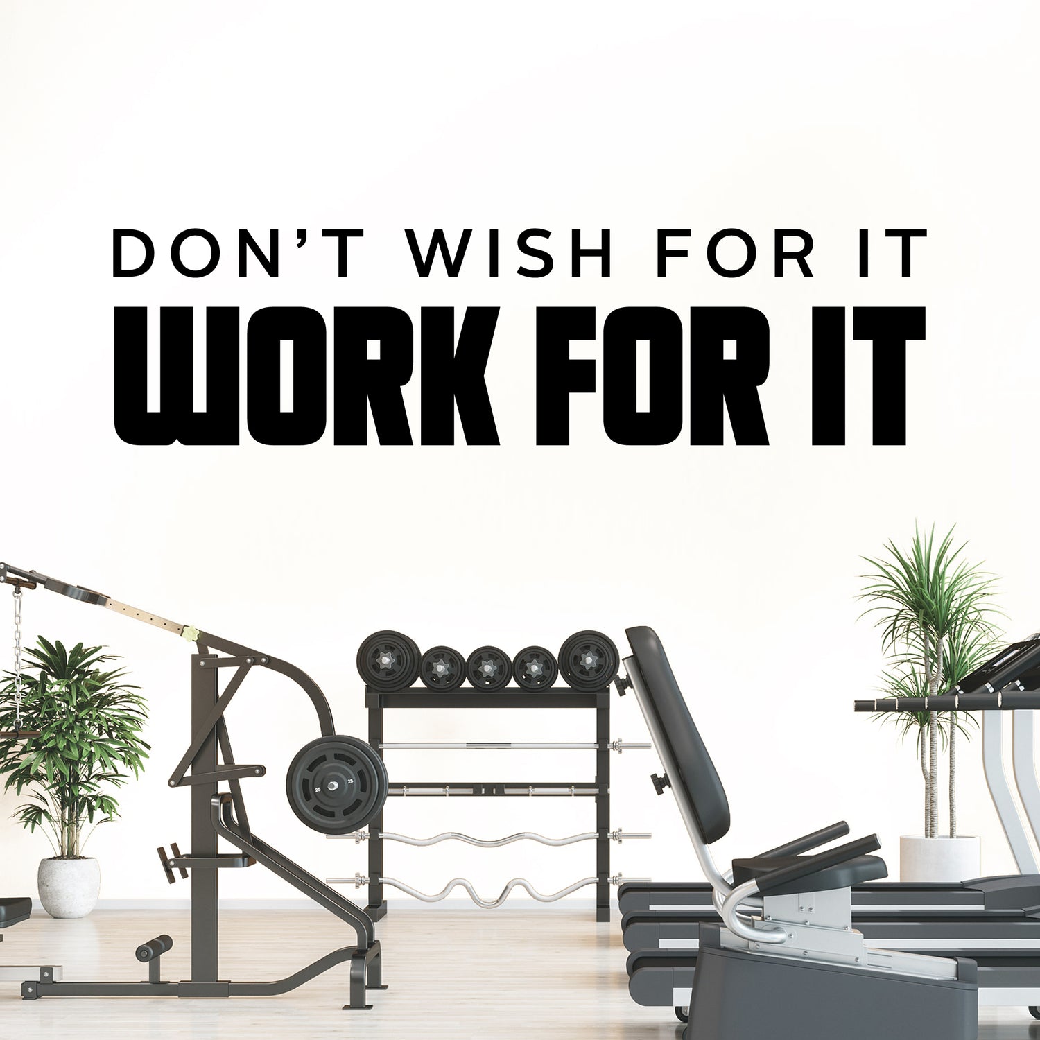 Gym equipment with motivational quote 'Don't wish for it, work for it' on a white background