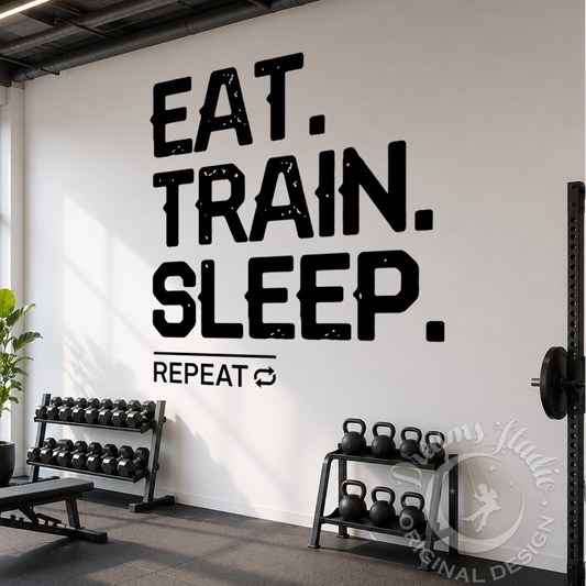Gym interior with motivational quote 'Eat. Train. Sleep. Repeat.' on the wall.