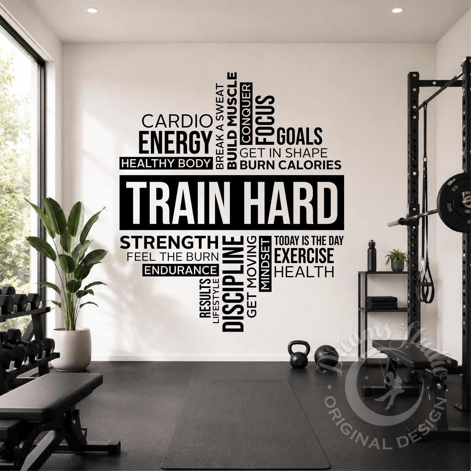 Gym interior with motivational fitness wall decal on a white wall.