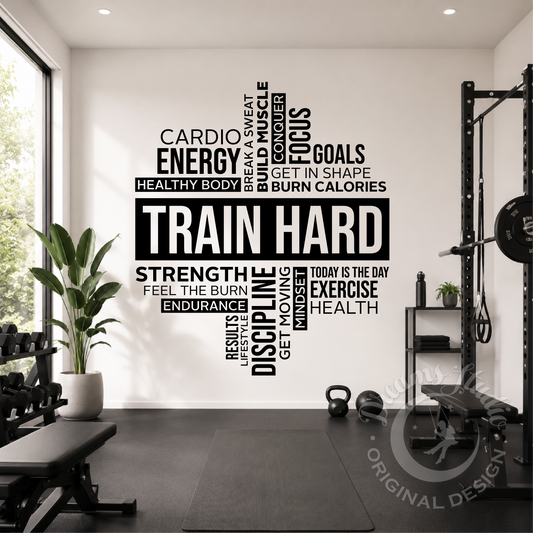 Gym interior with motivational fitness wall decal on a white wall.