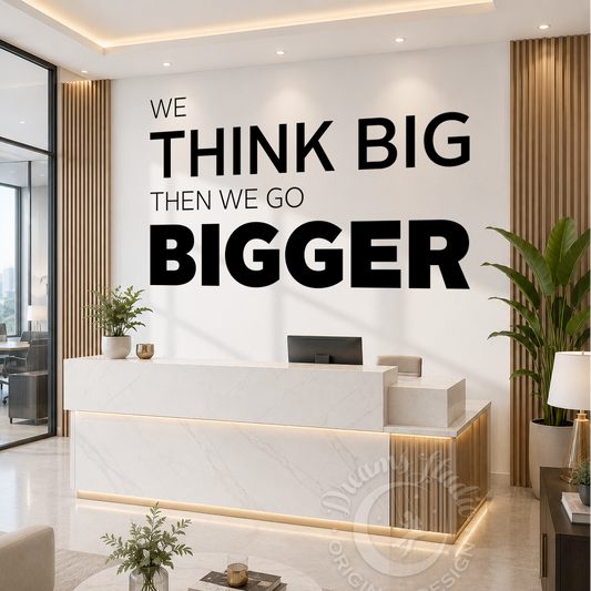 Modern office interior with a motivational quote on the wall.