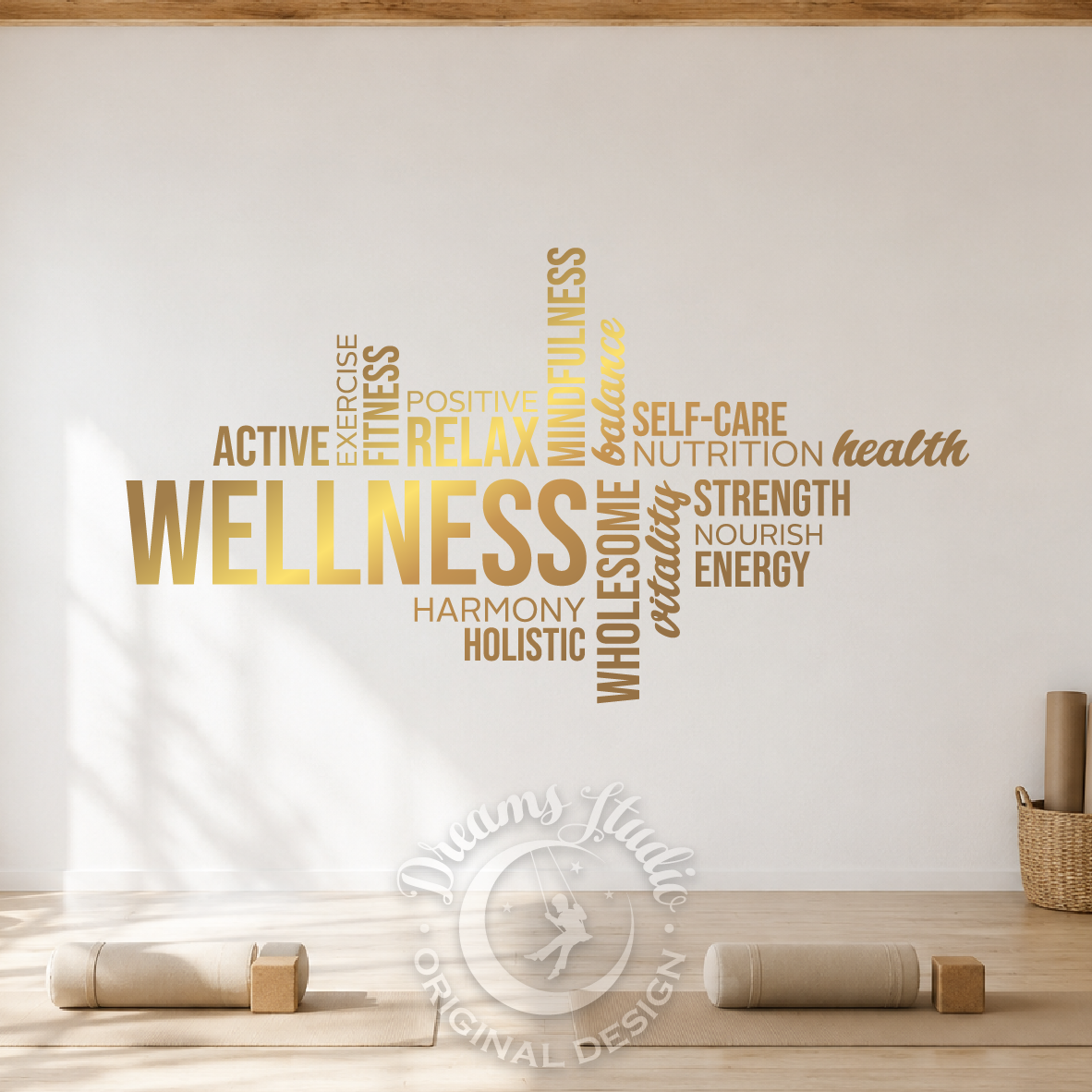 Yoga studio with wellness-themed wall decal and yoga props on a wooden floor.