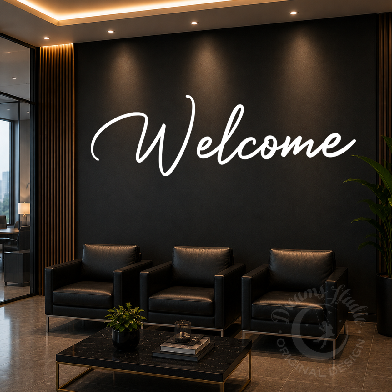 Modern interior with black leather sofa, coffee table, and 'Welcome' sign on a dark wall.