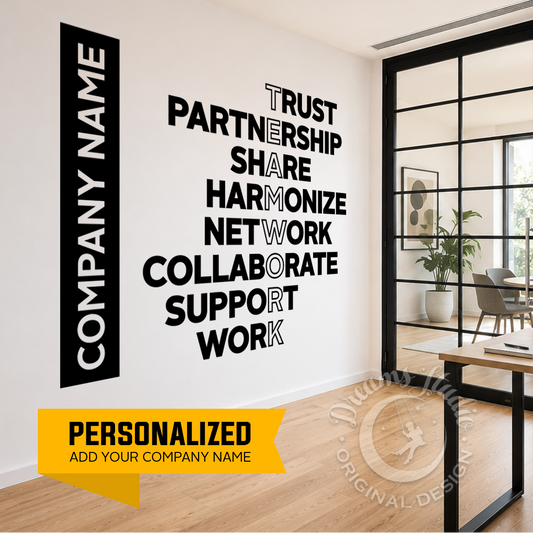 Modern office interior with motivational wall text and a desk.