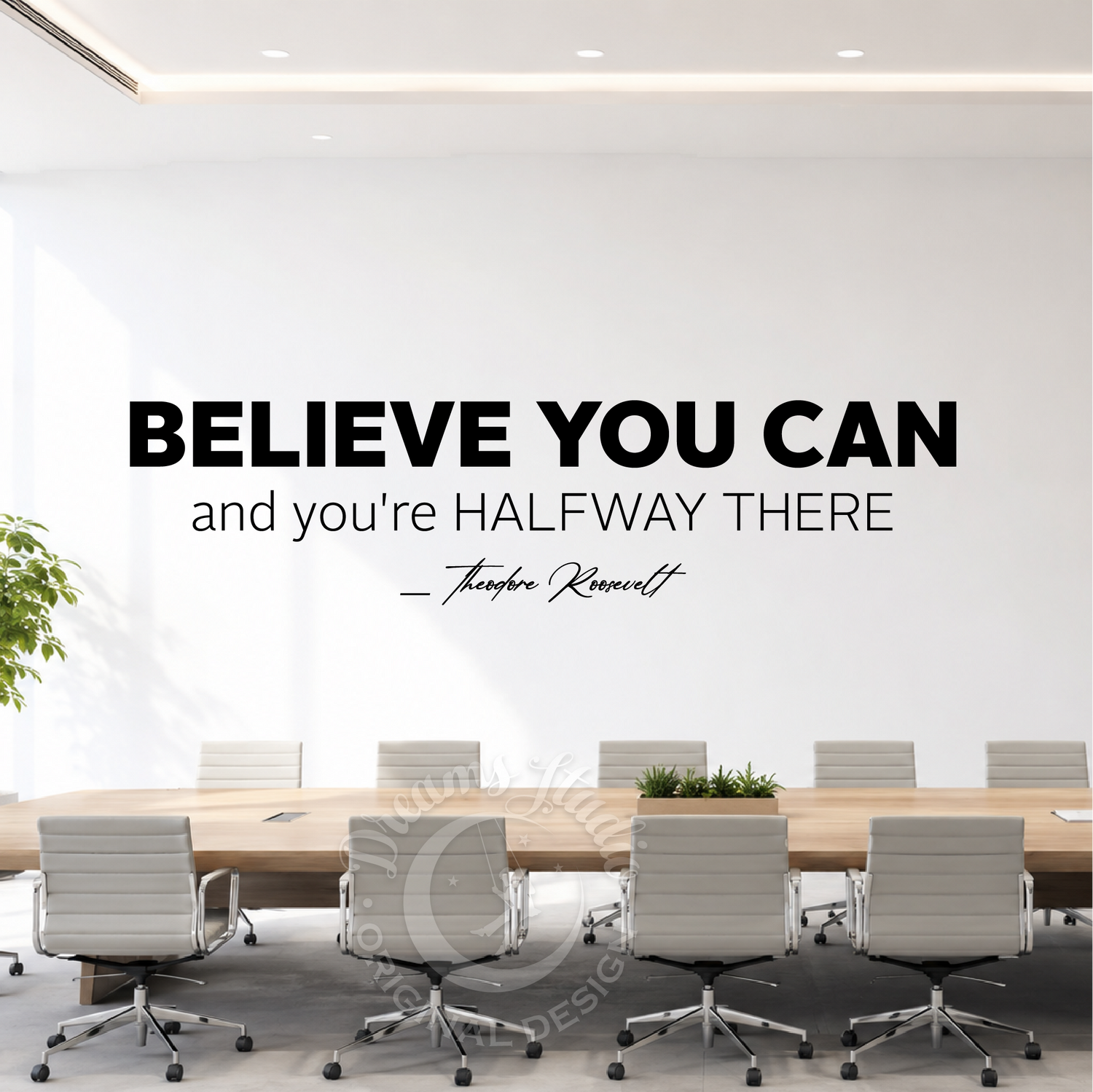 Modern conference room with motivational quote on the wall