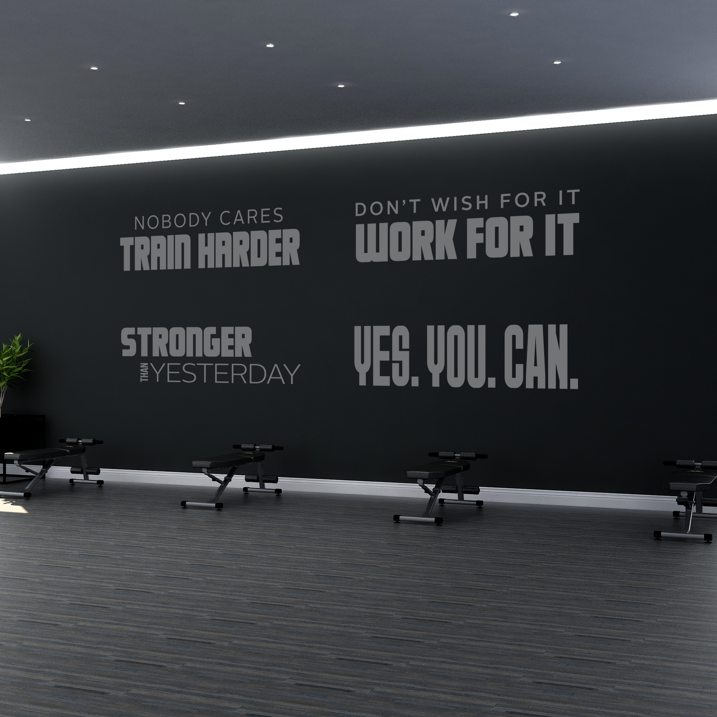 Gym interior with motivational wall quotes and workout equipment.