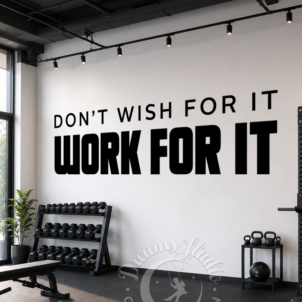 Gym interior with motivational quote on wall, equipment visible