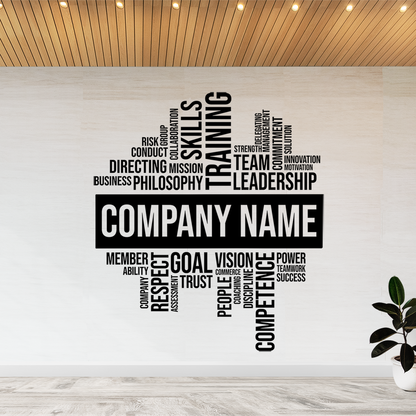 Wall with motivational phrases and 'Company Name' on a light-colored wall with a plant in the corner.