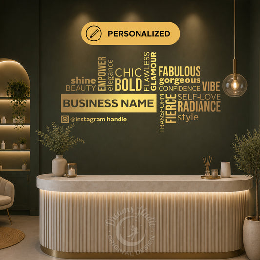 A personalized business name wall decal displayed on a dark green wall in a modern reception lobby. The gold and beige typography features words like 'BOLD', 'GORGEOUS', 'CONFIDENCE', and 'RADIANCE' surrounding the customizable 'BUSINESS NAME' text.