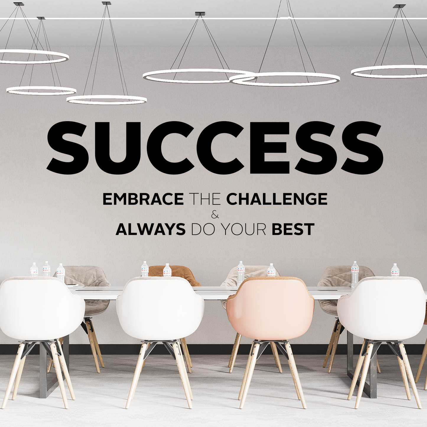 Modern office setting with motivational quote on the wall
